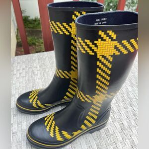 Kate Spade black, tall, rubber, boots, yellow trim, and pattern throughout, 8